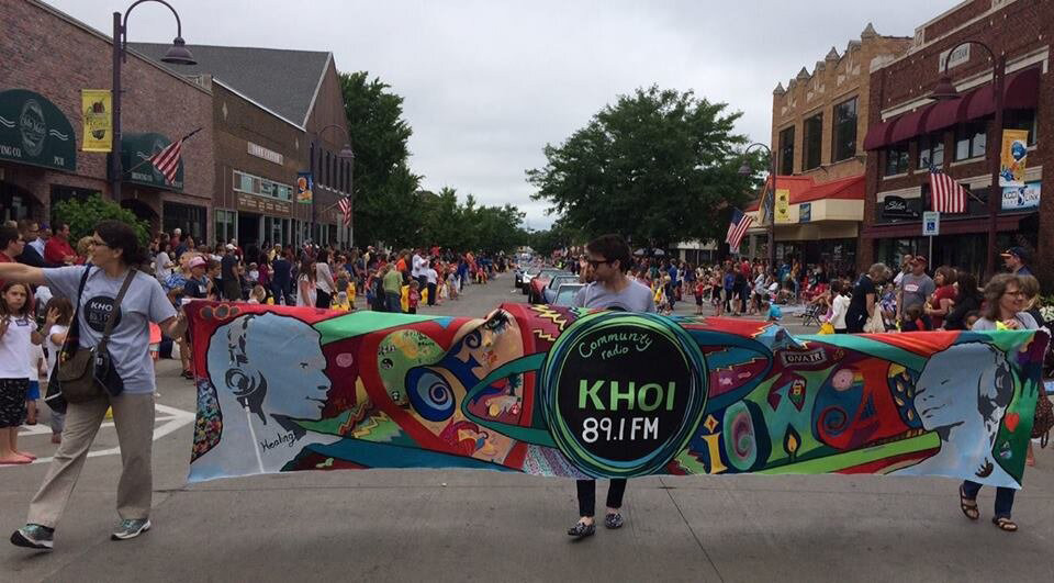 KHOI 89.1FM marching in a parade at Downtown Ames